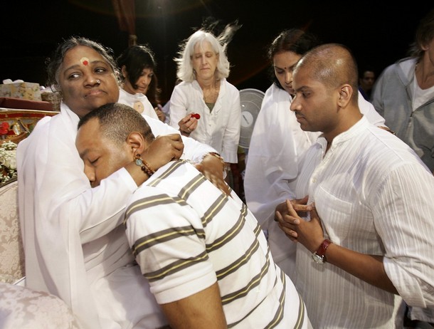 Amma, The Hugging Saint transfers love like a mother to child